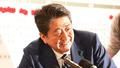 Kosningar og fellibylur í Japan: Útgönguspár gera ráð fyrir sigri Shinzo Abe